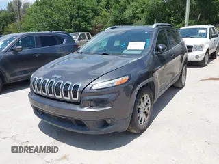 2016 Jeep Cherokee Latitude with VIN 1C4PJLCBXGW265431, listed as a IAAI auction lot 42542328 with 127,249 mi miles and . Bid and sale history available at DreamBid. Image 17.