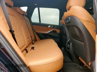 2023 BMW X5 sDrive40i with VIN 5UXCR4C07P9N48328, listed as a Copart auction lot 57619515 with 32,174 mi miles and Salvage title. Bid and sale history available at DreamBid. Image 11.