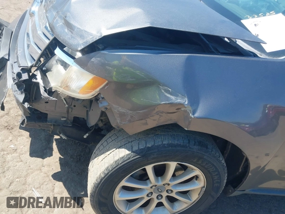 2010 Ford Edge SEL with VIN 2FMDK3JC0ABA36885, listed as a IAAI auction lot 41869192 with 187,549 mi miles. Bid and sale history available at carsss.com. Image 14.