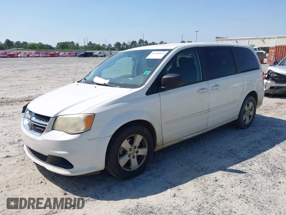 2013 Dodge Grand Caravan SE with VIN 2C4RDGBG9DR516044, listed as a IAAI auction lot 41998893 with 214,645 mi miles and . Bid and sale history available at DreamBid. Image 2.