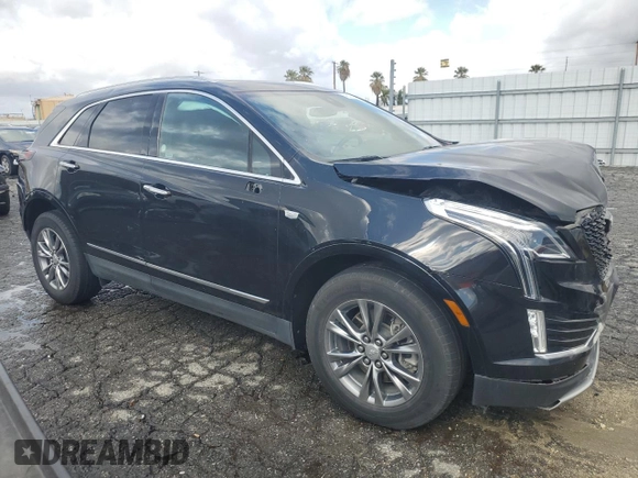 2023 Cadillac XT5 AWD Premium Luxury z VIN 1GYKNDRS6PZ144478, wystawiony jako Copart lot #45291295 z przebiegiem 45 910 mil mil oraz Nie do naprawy • Non repairable. Historia ofert i sprzedaży dostępna na DreamBid. Obrazek 4.