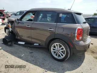 2015 MINI Countryman with VIN WMWZB3C55FWR46334, listed as a Copart auction lot 55421795 with 33,135 mi miles and Salvage Title. Bid and sale history available at DreamBid. Image 2.