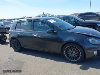 2014 Volkswagen GTI Driver's Edition with VIN WVWHD7AJ8EW003725, listed as a IAAI auction lot 41772639 with 131,500 mi miles. Bid and sale history available at carsss.com. Image 14.