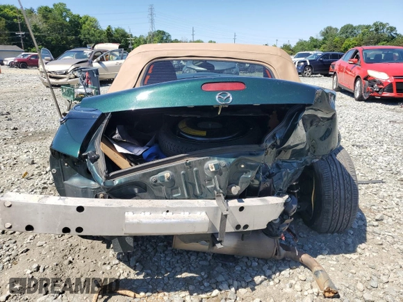2001 Mazda MX-5 Miata with VIN JM1NB353410203639, listed as a Copart auction lot 56447414 with 131,520 mi miles and Salvage Title. Bid and sale history available at DreamBid. Image 6.