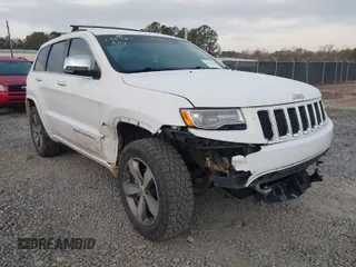 2015 Jeep Grand Cherokee High Altitude with VIN 1C4RJECG8FC175565, listed as a IAAI auction lot 41733248 with 107,947 mi miles. Bid and sale history available at carsss.com. Image 1.