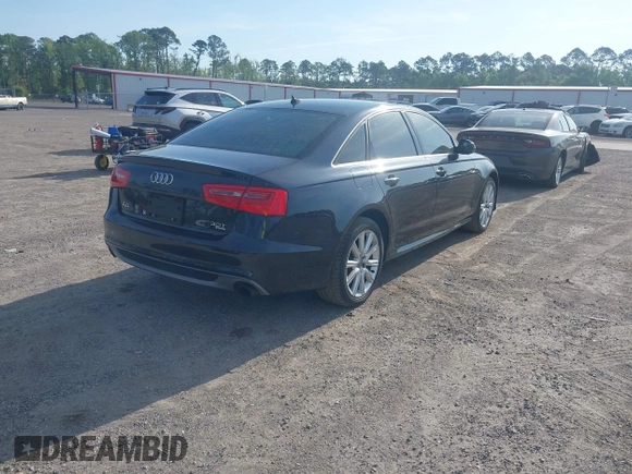 2015 Audi A6 3.0T Prestige with VIN WAUHGAFC3FN011654, listed as a IAAI auction lot 42104153 with 166,719 mi miles. Bid and sale history available at carsss.com. Image 4.
