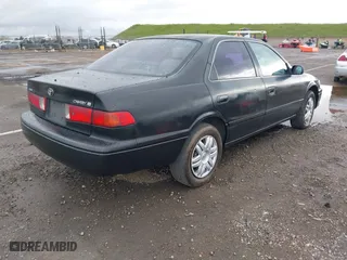 2000 Toyota Camry CE with VIN JT2BG22KXY0432288, listed as a IAAI auction lot 41927856 with 203,035 mi miles. Bid and sale history available at carsss.com. Image 4.