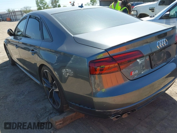 2016 Audi S8 Plus with VIN WUAJ5AFD2GN900596, listed as a IAAI auction lot 42014762 with 1 mi miles. Bid and sale history available at carsss.com. Image 3.