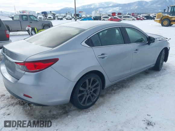 2014 Mazda Mazda6 i Touring with VIN JM1GJ1V62E1134427, listed as a IAAI auction lot 41550411 with 112,804 mi miles. Bid and sale history available at carsss.com. Image 4.