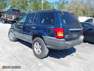 2001 Jeep Grand Cherokee Laredo with VIN 1J4GW48S91C721227, listed as a IAAI auction lot 41792524 with 229,973 mi miles. Bid and sale history available at carsss.com. Image 3.