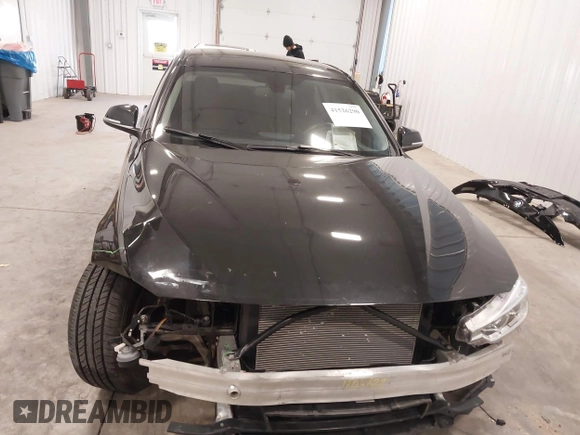 2018 BMW 3 Series 320i xDrive with VIN WBA8E5G5XJNU46855, listed as a IAAI auction lot 41526290 with 68,720 mi miles. Bid and sale history available at carsss.com. Image 13.