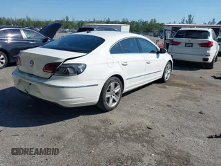 2013 Volkswagen CC Sport Plus с VIN WVWBP7AN5DE550701, выставлен на аукционе IAAI как лот 41791421 с пробегом 124 503 миль миль и . История ставок и продаж доступна на DreamBid. Изображение 4.