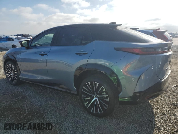 2024 Lexus RZ 300e Premium с VIN JTJABABB2RA003229, выставлен на аукционе Copart как лот 55311235 с пробегом 2 759 миль миль и Списание • Salvage title. История ставок и продаж доступна на DreamBid. Изображение 2.