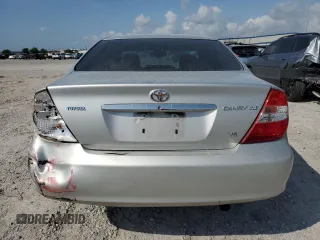 2002 Toyota Camry XLE z VIN 4T1BF32K22U532171, wystawiony jako Copart lot #54527965 z przebiegiem 165 637 mil mil oraz Szkoda całkowita • Salvage title. Historia ofert i sprzedaży dostępna na DreamBid. Obrazek 6.