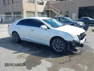2016 Cadillac XTS Premium Collection z VIN 2G61P5S3XG9118029, wystawiony jako IAAI lot #42335513 z przebiegiem 102 667 mil mil oraz . Historia ofert i sprzedaży dostępna na DreamBid. Obrazek 1.