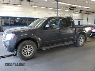 2014 Nissan Frontier SV with VIN 1N6AD0EV9EN710020, listed as a Copart auction lot 60895575 with 125,090 mi miles and Salvage title. Bid and sale history available at DreamBid. Image 1.