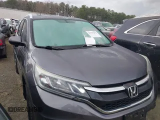 2015 Honda CR-V EX-L with VIN 2HKRM4H72FH648729, listed as a IAAI auction lot 41797852 with 106,140 mi miles. Bid and sale history available at carsss.com. Image 1.