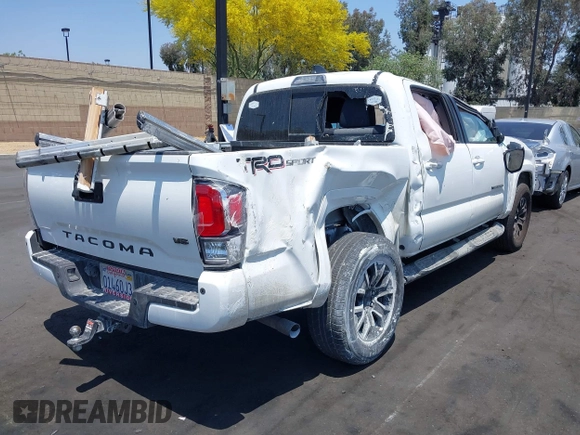 2022 Toyota Tacoma SR5 with VIN 3TMAZ5CN0NM161578, listed as a IAAI auction lot 42430201 with 39,654 mi miles and . Bid and sale history available at DreamBid. Image 4.