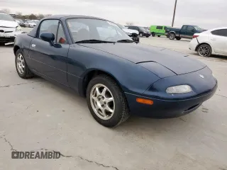 1994 Mazda MX-5 Miata with VIN JM1NA3537R0512679, listed as a Copart auction lot 45649075 with 126,476 mi miles and Salvage title. Bid and sale history available at DreamBid. Image 4.