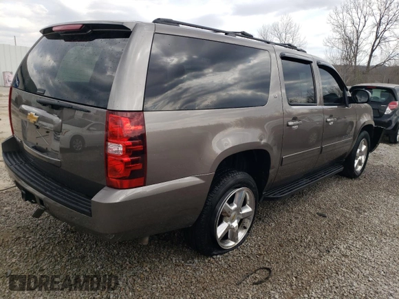 2013 Chevrolet Suburban LT with VIN 1GNSKJE7XDR341736, listed as a Copart auction lot 48781145 with 157,871 mi miles and Salvage Title. Bid and sale history available at DreamBid. Image 3.