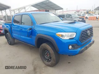2021 Toyota Tacoma SR5 with VIN 3TMAZ5CN6MM145822, listed as a IAAI auction lot 42803066 with 44,614 mi miles and . Bid and sale history available at DreamBid. Image 1.