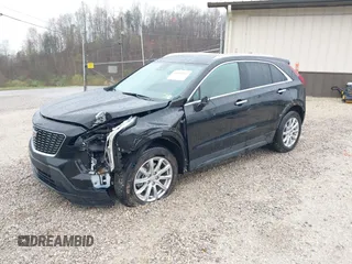 2023 Cadillac XT4 AWD Luxury with VIN 1GYFZBR42PF103973, listed as a IAAI auction lot 41902923 with 70,571 mi miles and . Bid and sale history available at DreamBid. Image 18.