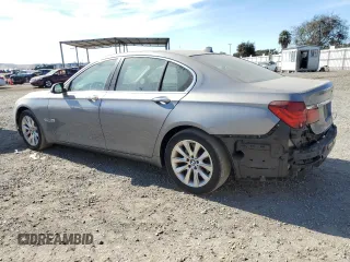 2014 BMW 7 Series 740i with VIN WBAYA6C55ED144487, listed as a Copart auction lot 77044014 with 86,149 mi miles and Salvage Title. Bid and sale history available at carsss.com. Image 2.