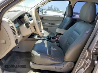 2009 Ford Escape XLS with VIN 1FMCU02739KC12318, listed as a Copart auction lot 61251485 with 179,335 mi miles and Salvage title. Bid and sale history available at DreamBid. Image 7.