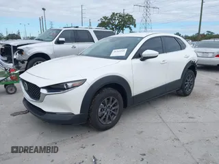 2024 Mazda CX-30 2.5 S with VIN 3MVDMBAMXRM610693, listed as a IAAI auction lot 41369268 with 60,842 mi miles. Bid and sale history available at carsss.com. Image 2.