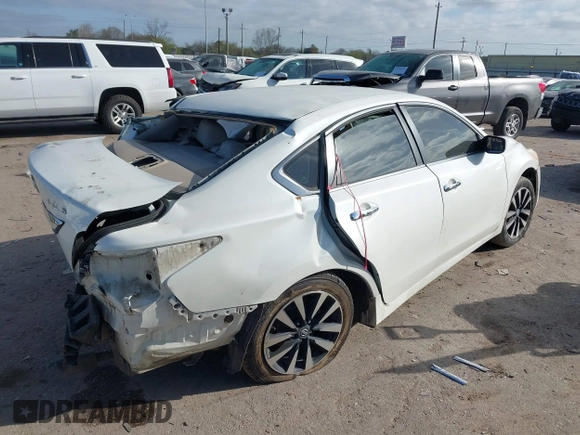 2014 Nissan Altima SV with VIN 1N4AL3AP0EC278546, listed as a IAAI auction lot 41762901 with 121,756 mi miles and . Bid and sale history available at DreamBid. Image 4.