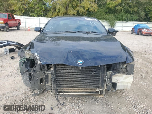 2007 BMW 6 Series 650i z VIN WBAEH13567CR51918, wystawiony jako Copart lot #76337784 z przebiegiem 135 313 mil mil oraz Szkoda całkowita • Salvage title. Historia ofert i sprzedaży dostępna na DreamBid. Obrazek 5.