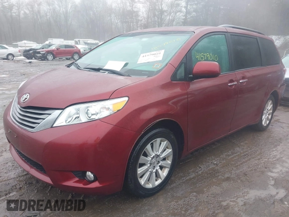 2015 Toyota Sienna Ltd with VIN 5TDDK3DC5FS106080, listed as a IAAI auction lot 41579010 with 133,495 mi miles. Bid and sale history available at carsss.com. Image 2.