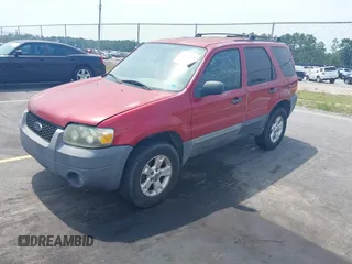 2006 Ford Escape XLT with VIN 1FMYU03136KD09448, listed as a IAAI auction lot 42578120 with 235,521 mi miles and . Bid and sale history available at DreamBid. Image 2.