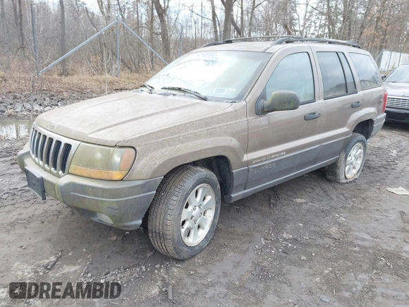 2001 Jeep Grand Cherokee Laredo with VIN 1J4GW48SX1C658610, listed as a IAAI auction lot 41831013 with 200,142 mi miles and . Bid and sale history available at DreamBid. Image 2.