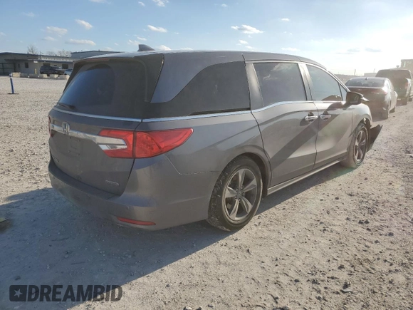 2019 Honda Odyssey Touring with VIN 5FNRL6H85KB022527, listed as a Copart auction lot 43851485 with 104,332 mi miles and Salvage Title. Bid and sale history available at carsss.com. Image 3.