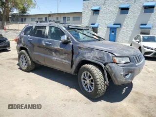 2014 Jeep Grand Cherokee Limited with VIN 1C4RJFBM3EC384398, listed as a Copart auction lot 57703835 with 153,255 mi miles and Salvage title. Bid and sale history available at DreamBid. Image 4.