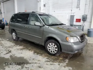2005 Kia Sedona LX with VIN KNDUP132656723226, listed as a Copart auction lot 52886115 with 0 mi miles and Salvage Title. Bid and sale history available at carsss.com. Image 4.