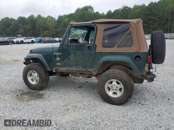1999 Jeep Wrangler Sahara with VIN 1J4FY49S0XP489462, listed as a Copart auction lot 54750405 with 134,134 mi miles and Non repairable. Bid and sale history available at DreamBid. Image 2.