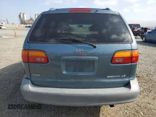 2000 Toyota Sienna LE z VIN 4T3ZF13C8YU250689, wystawiony jako Copart lot #57168425 z przebiegiem 133 890 mil mil oraz Szkody całkowita. Historia ofert i sprzedaży dostępna na DreamBid. Obrazek 6.