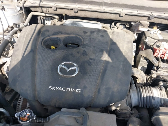 2020 Mazda CX-5 Grand Touring with VIN JM3KFADM5L0739306, listed as a IAAI auction lot 42215667 with 126,100 mi miles and . Bid and sale history available at DreamBid. Image 10.