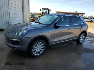 2012 Porsche Cayenne S Hybrid z VIN WP1AE2A21CLA92870, wystawiony jako Copart lot #82537854 z przebiegiem 166 770 mil mil oraz Tytuł czysty. Historia ofert i sprzedaży dostępna na DreamBid. Obrazek 1.