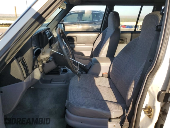1997 Jeep Cherokee Sport with VIN 1J4FT68S9VL547391, listed as a Copart auction lot 70447484 with 250,171 mi miles and Salvage Title. Bid and sale history available at carsss.com. Image 7.