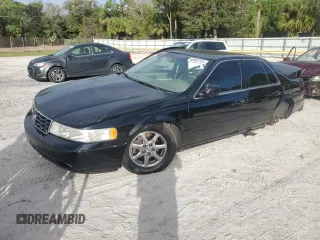2002 Cadillac Seville Luxury SLS z VIN 1G6KS54Y42U220496, wystawiony jako Copart lot #80883764 z przebiegiem 221 629 mil mil oraz Czysty tytuł • Clean title. Historia ofert i sprzedaży dostępna na DreamBid. Obrazek 1.