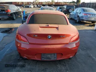 2011 BMW Z4 sDrive35is with VIN WBALM1C54BE393857, listed as a Copart auction lot 72769234 with 88,986 mi miles and Salvage Title. Bid and sale history available at carsss.com. Image 6.