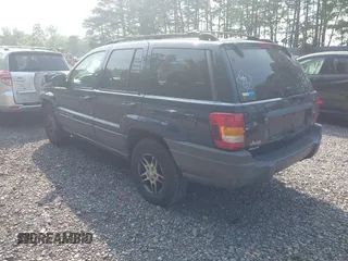2004 Jeep Grand Cherokee Laredo with VIN 1J4GW48NX4C405558, listed as a IAAI auction lot 42440639 with 197,457 mi miles and . Bid and sale history available at DreamBid. Image 3.