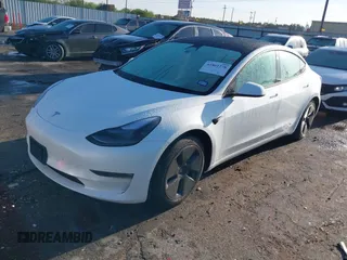 2023 Tesla Model 3 Long Range with VIN 5YJ3E1EB6PF633550, listed as a IAAI auction lot 41861278 with 45,743 mi miles and . Bid and sale history available at DreamBid. Image 2.