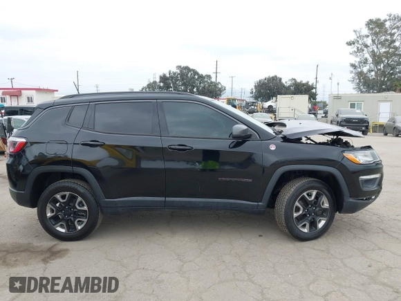 2018 Jeep Compass Trailhawk with VIN 3C4NJDDB3JT451658, listed as a IAAI auction lot 42087588 with 90,189 mi miles and . Bid and sale history available at DreamBid. Image 13.