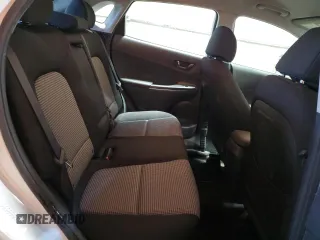 2021 Hyundai Kona SE z VIN KM8K12AA5MU691612, wystawiony jako Copart lot #56433625 z przebiegiem 85 499 mil mil oraz Szkoda całkowita • Salvage title. Historia ofert i sprzedaży dostępna na DreamBid. Obrazek 11.