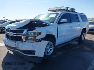 2019 Chevrolet Suburban LT with VIN 1GNSCHKC3KR143942, listed as a IAAI auction lot 41896633 with 153,139 mi miles and . Bid and sale history available at DreamBid. Image 17.