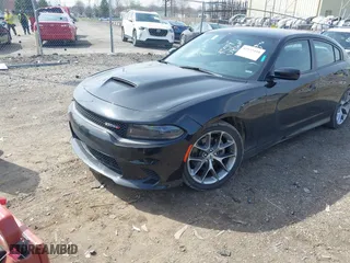 2023 Dodge Charger GT with VIN 2C3CDXHG5PH554513, listed as a IAAI auction lot 41935410 with 52,506 mi miles. Bid and sale history available at carsss.com. Image 17.